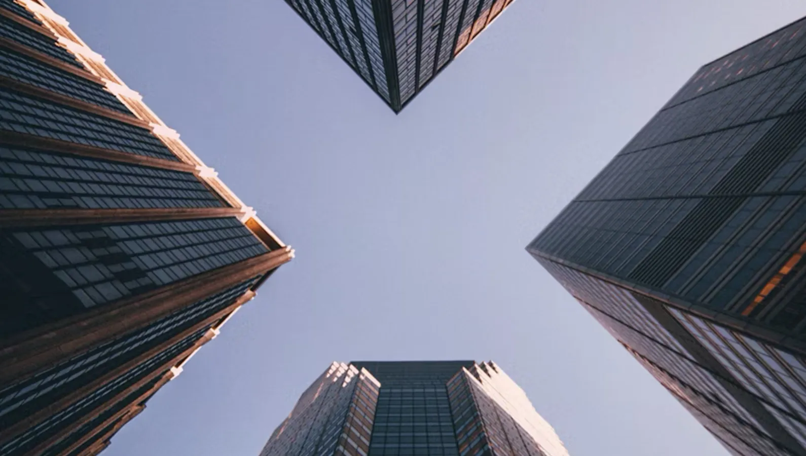Four skyscrapers against the sky