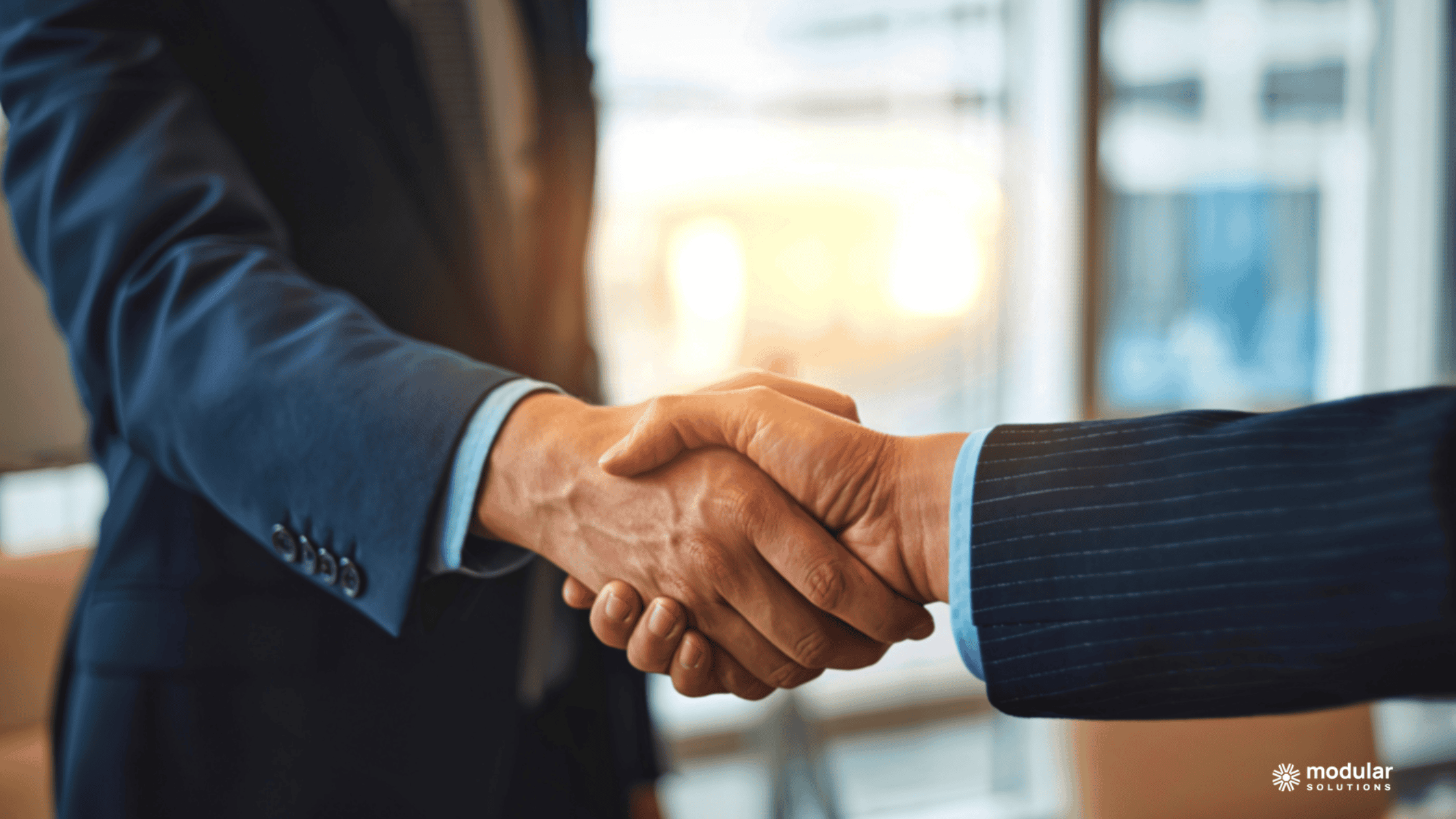 Insurance professionals shaking hands